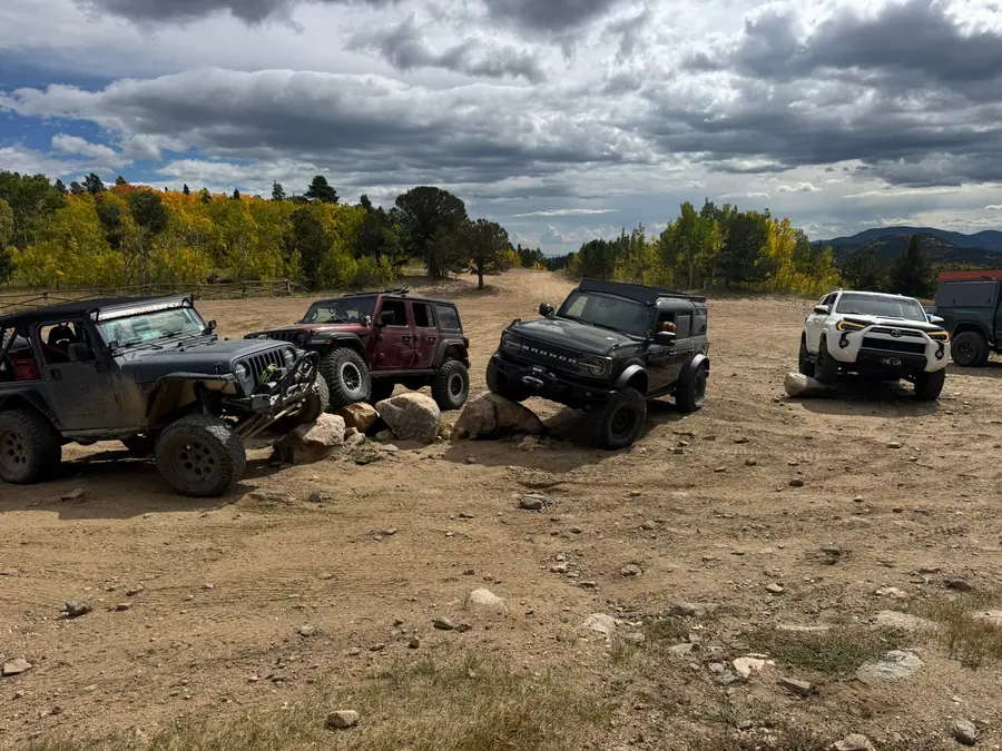 Jeeps parked on rocky ground during an Off-Camber trail day