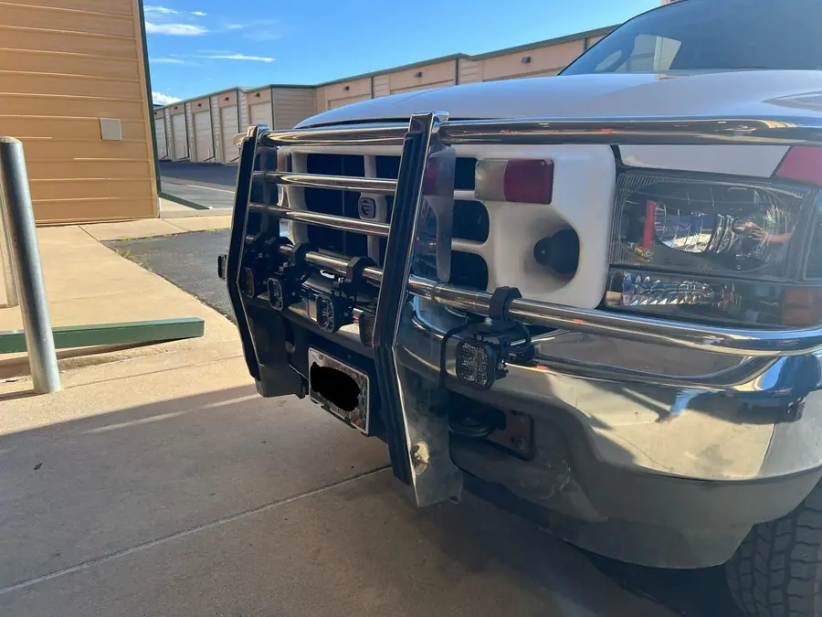 Grille guard and lighting work on a fleet vehicle