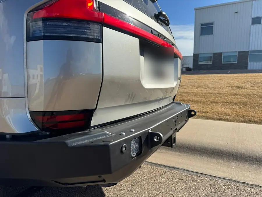 Steel rear bumper on a silver SUV