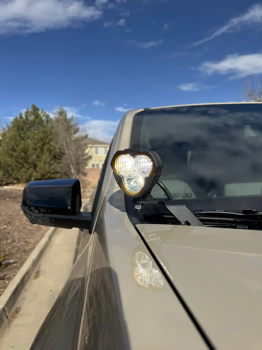 KC LED pod lit on the cowl of a Chevy Colorado ZR2