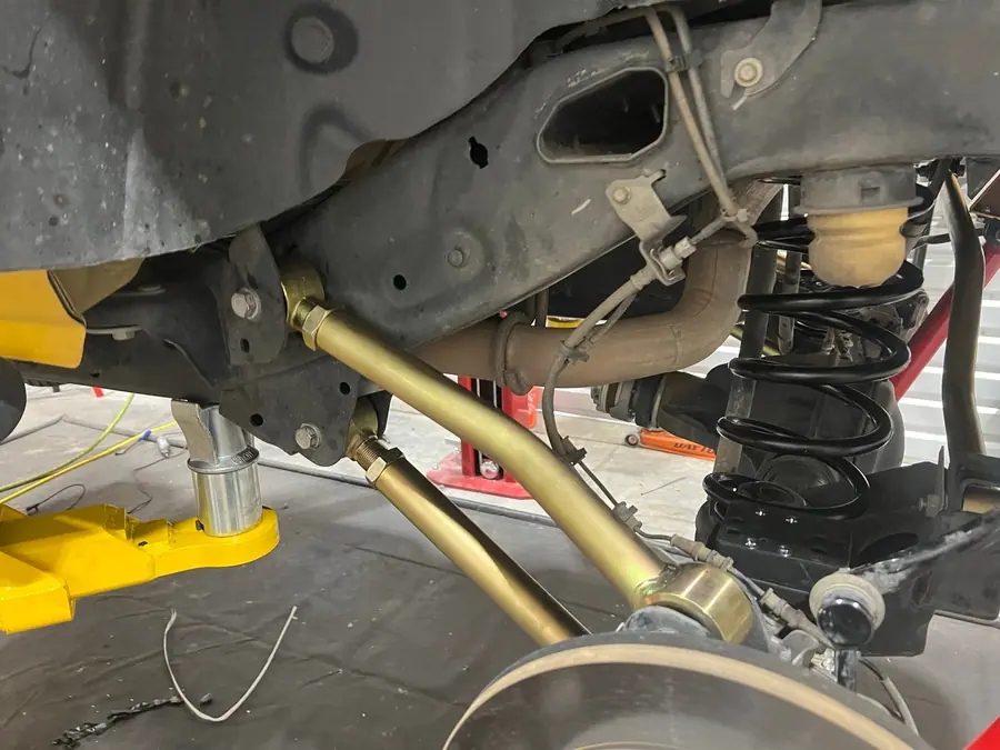 MetalCloak control arm and coil spring installed on a Jeep Wrangler JL front axle