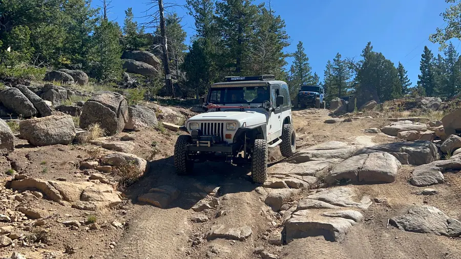 Jeep Wrangler working through a boulder field