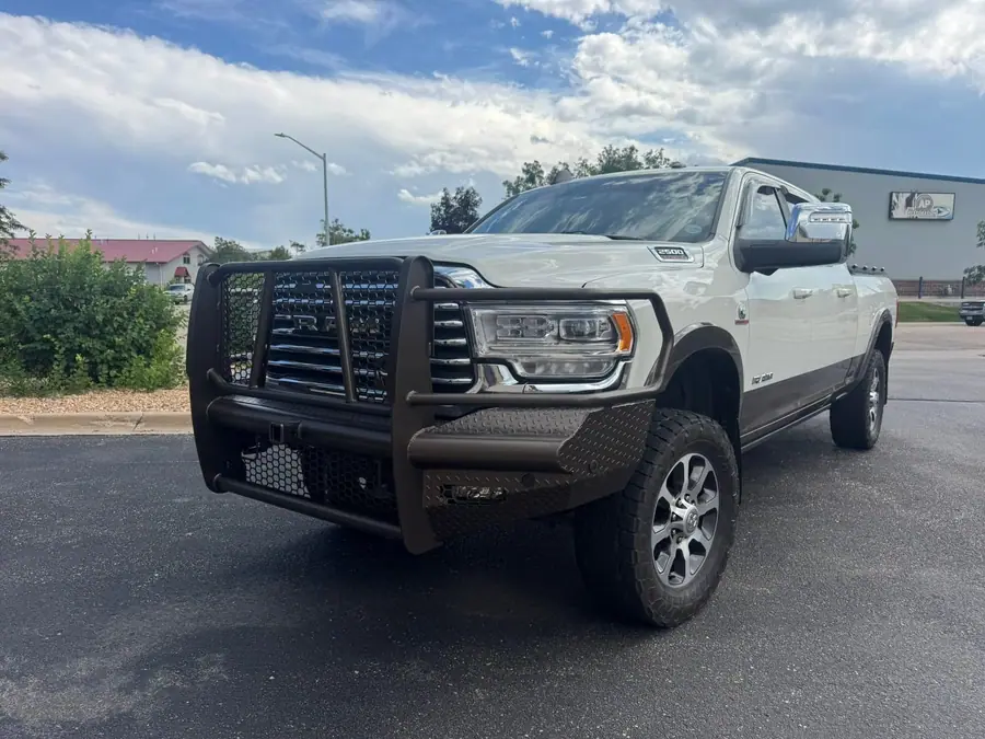 Grille guard and front bumper on a lifted Ram 2500
