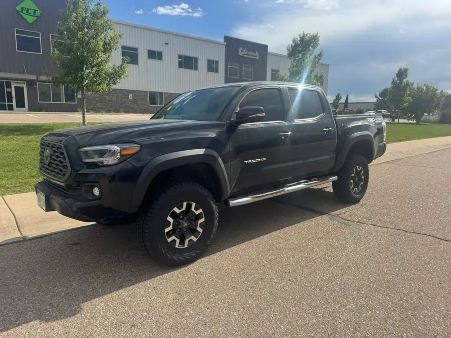 Lifted Toyota Tacoma with a front bumper