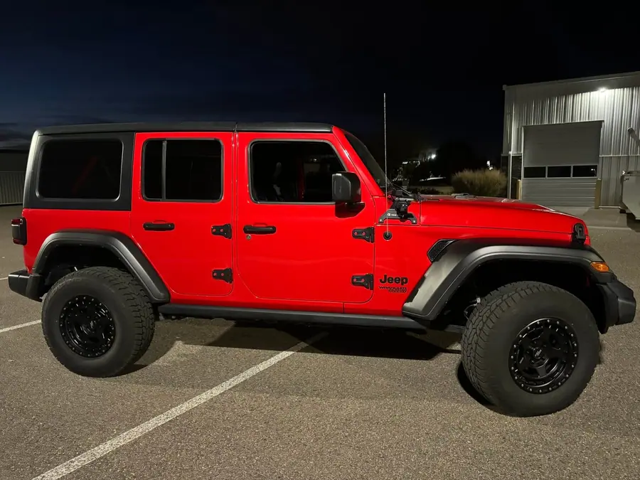 Lifted red Jeep Wrangler JL Unlimited