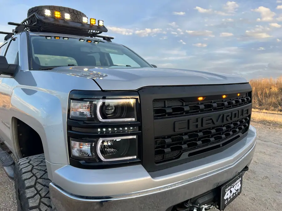 Light bar and pods on a lifted Chevy Silverado