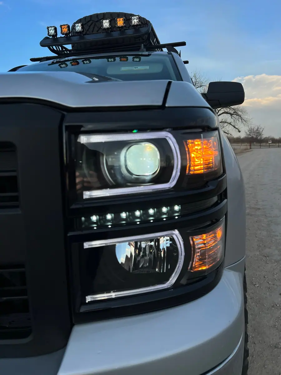 Aftermarket LED headlight with daytime running light on a 2016 Chevy Silverado 1500