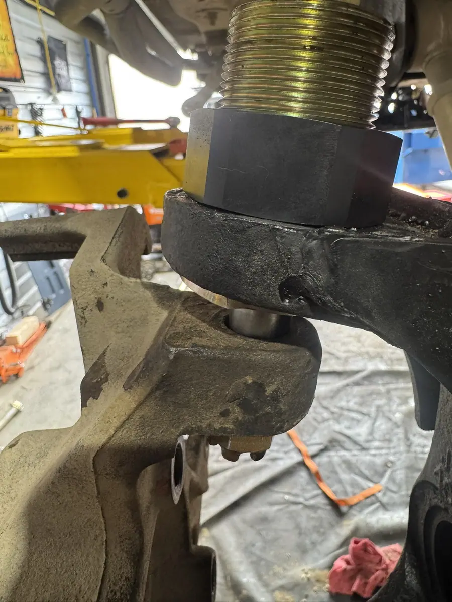 MetalCloak Baller Joint pressed into a Jeep front axle knuckle