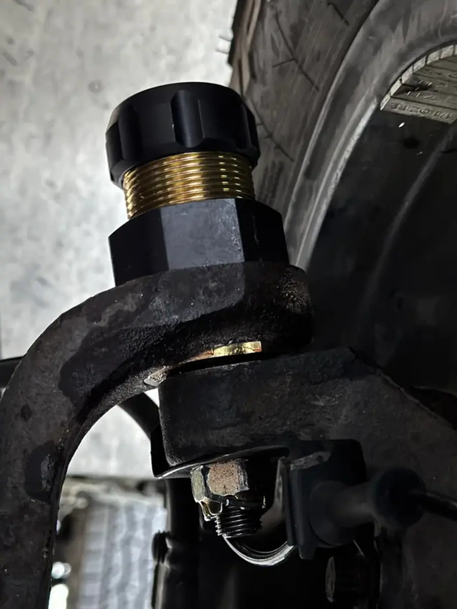 Close-up of an installed MetalCloak upper Baller Joint with its adjuster cap