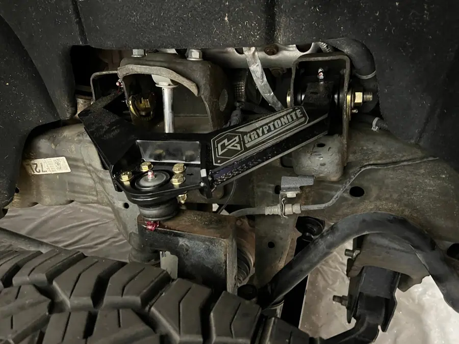 Kryptonite upper control arm installed on an independent front suspension truck