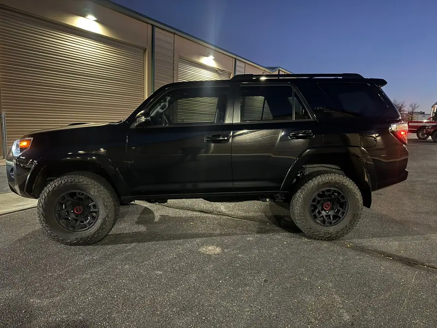 Lifted black Toyota 4Runner on black wheels