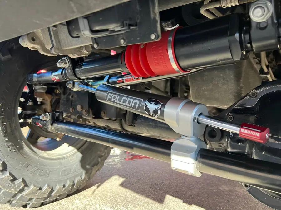 Yeti heavy-duty tie rod and drag link with a Falcon steering stabilizer on a Jeep Wrangler JK front axle